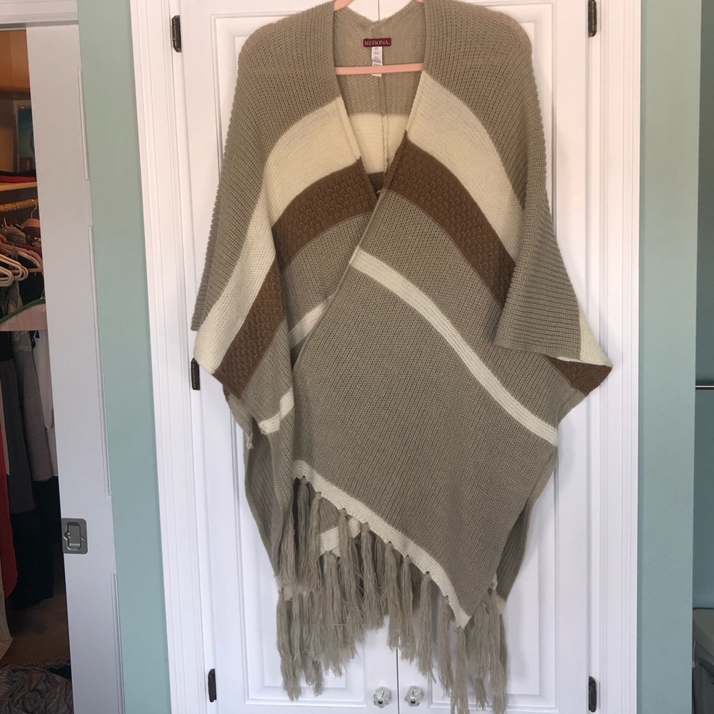 Poncho with neutral stripes and fringe